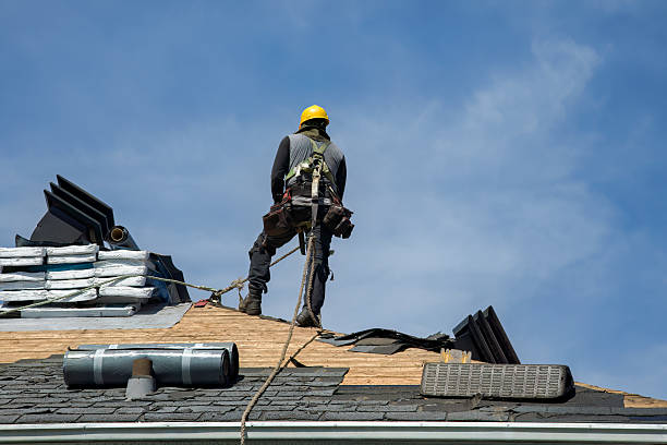 Professional Storm Damage Roof Repair technician working in Everett, MA